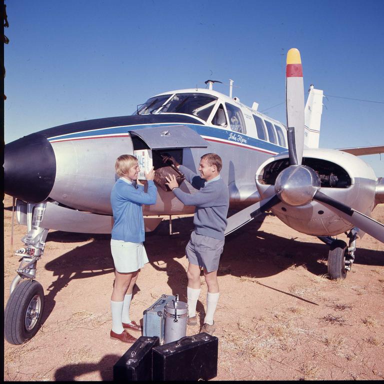 1970 - Nursing Sister June Beattie helping the Flying Doctor Dr. David Cooke. Picture: Ted Holliday.