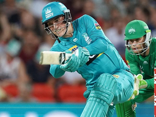 Tom Banton of the Heat hits a six during the Big Bash League (BBL) cricket match between the Brisbane Heat at the Melbourne Stars at Metricon Stadium on the Gold Coast, Friday, December 20, 2019. (AAP Image/Dave Hunt) NO ARCHIVING, EDITORIAL USE ONLY, IMAGES TO BE USED FOR NEWS REPORTING PURPOSES ONLY, NO COMMERCIAL USE WHATSOEVER, NO USE IN BOOKS WITHOUT PRIOR WRITTEN CONSENT FROM AAP