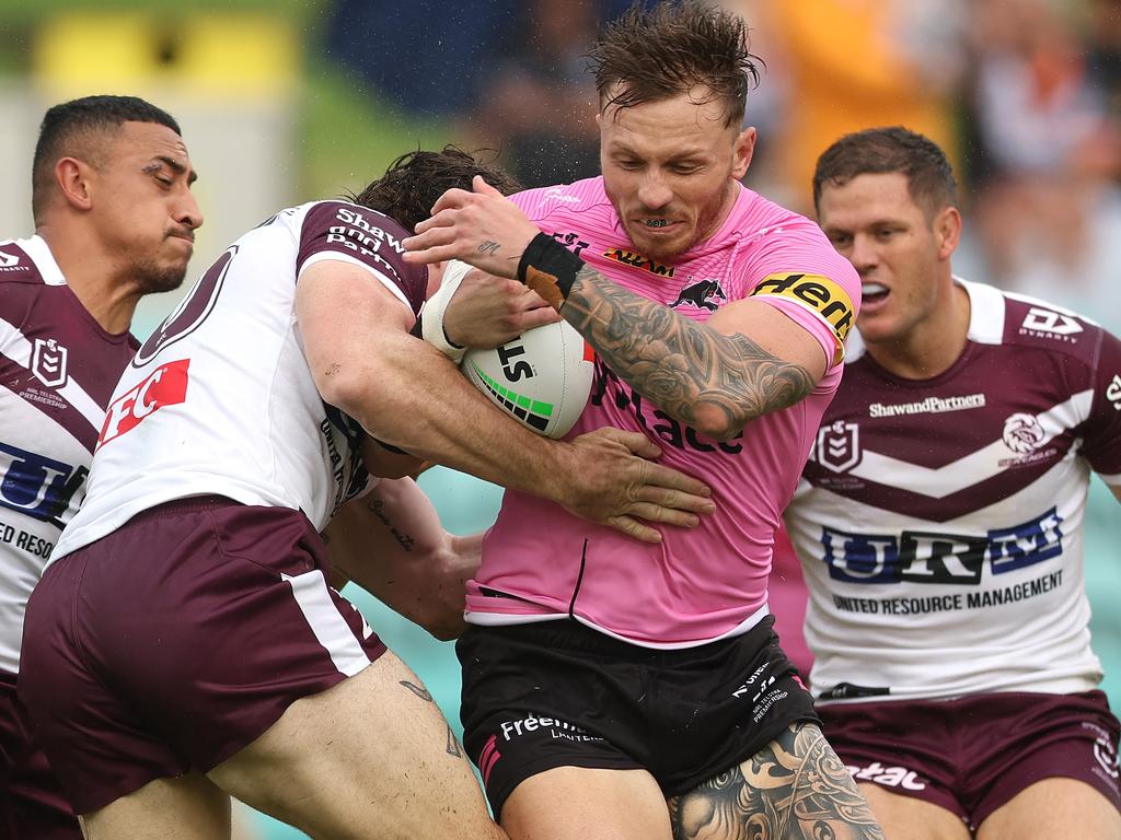 Austin Dias of the Panthers is tackled. Picture: Mark Metcalfe/Getty Images