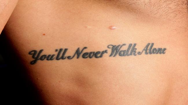 “You’ll Never Walk Alone” tattooed on Robbie Farah’s ribs. Picture: Gregg Porteous