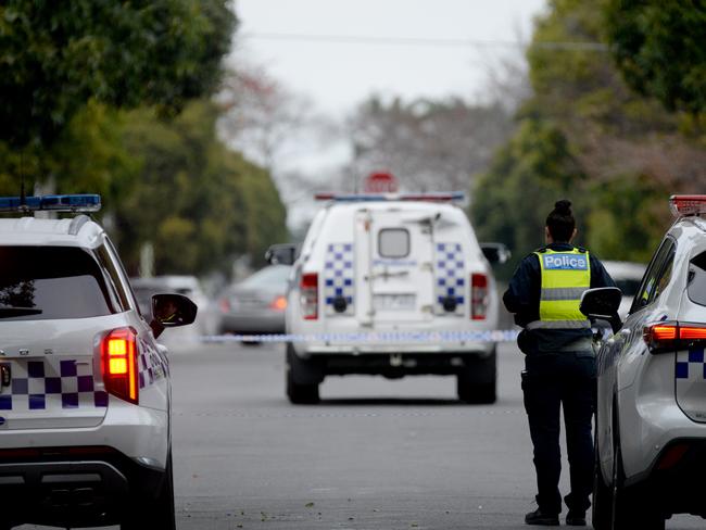 Police at the scene in Brighton where a man was found injured and later died. Picture: Andrew Henshaw