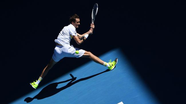 Daniil Medvedev hits a return against Vasek Pospisil in Melbourne on Tuesday. Picture: AFP