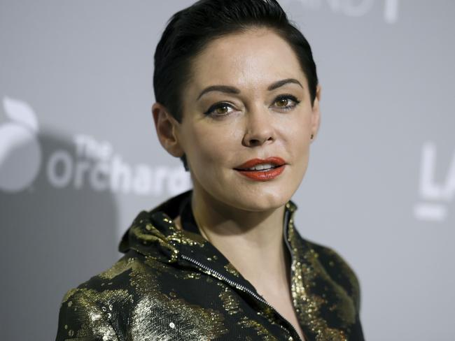 Rose McGowan emerged from a brief suspension on Twitter on Thursday to offer her most pointed accusation that she was sexually abused by film mogul Harvey Weinstein. Weinstein's representative says the producer denies he engaged in ‘any non-consensual contact’. Picture: Richard Shotwell/Invision/AP