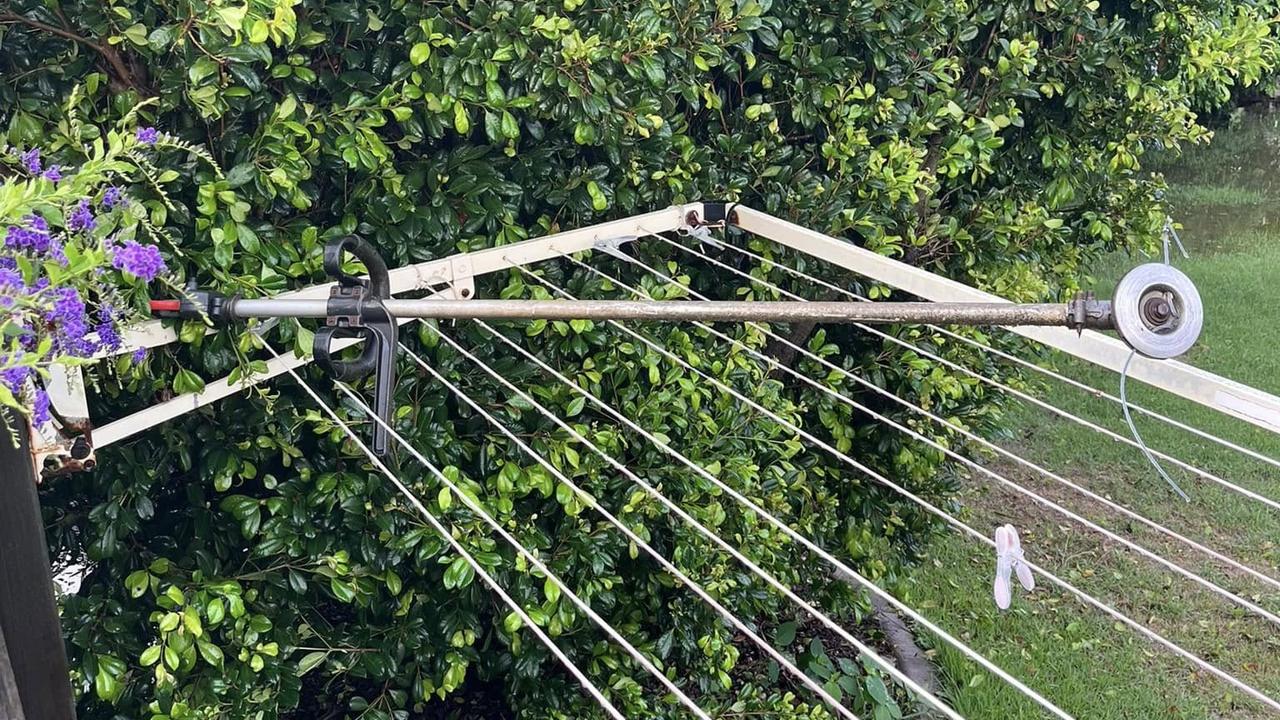 Fellow residents shared a photo of a whipper-snipper on their clothesline after the “mini twister”.