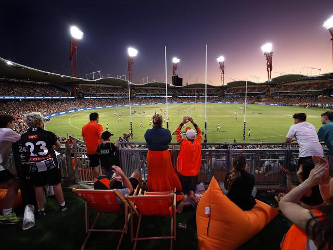 Giants fans cheer on during their side’s win over Colingwood in Opening Round. Picture: Phil Hillyard.