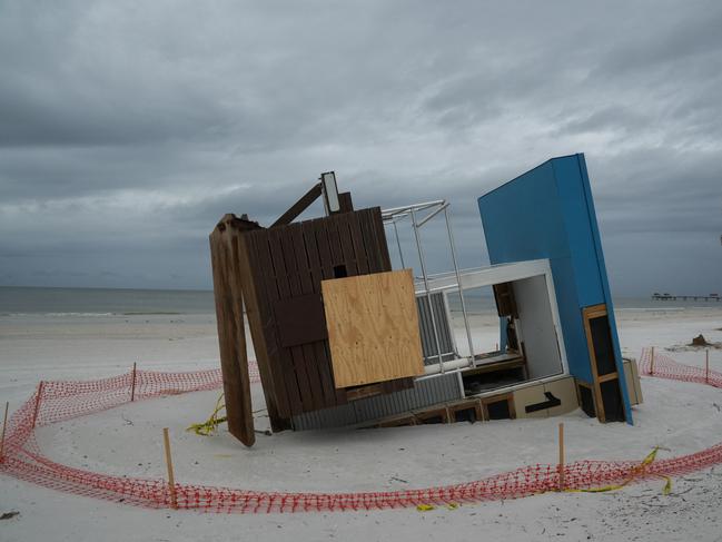 A collapsed lifeguard tower as a result of Hurricane Helene is seen in Clearwater, Florida ahead of Hurricane Milton, which has strengthened to a Cat. 4 storm. Picture: AFP