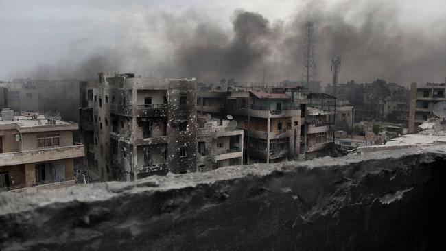 Smoke rises over Saif Al Dawla district, in Aleppo, Syria. (AP Photo/Manu Brabo, File)