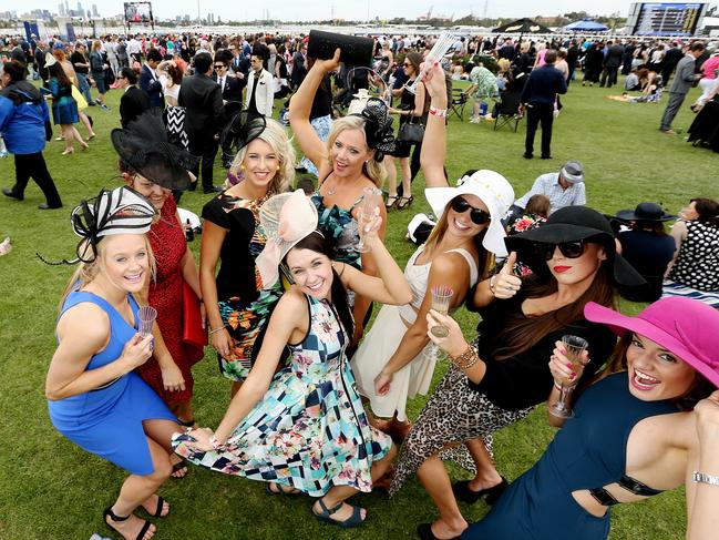 Punters enjoy the 2014 Melbourne Cup. Picture: Tim Carrafa