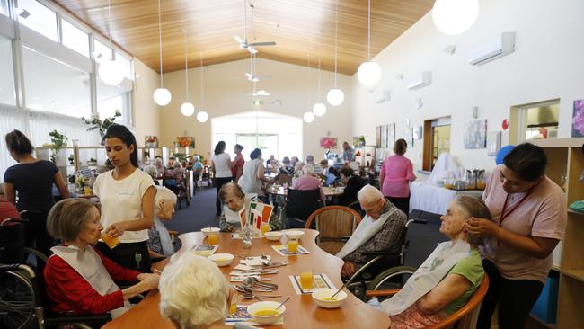 Residents of Allambie Heights Village in Sydney have lunch in the common area where visitors are now barred. Picture: Nikki Short