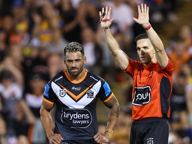 Apisai Koroisau of the Tigers is sent to the sin bin by referee Peter Gough for the tackle on Clint Gutherson. Picture: Getty Images