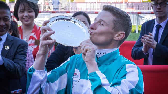 James McDonald kisses his Cox Plate trophy. Picture: Mark Stewart