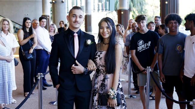 Melody Neal arrives at the Peace Lutheran College formal evening at the Cairns Convention Centre with her date Hunter Smith three months after the schoolyard attack. Picture: Brendan Radke