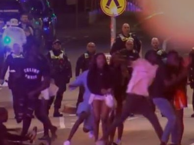 Police at the scene as partygoers fight. Picture: 7 News