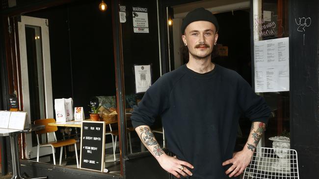 Tom, a barista and waiter at Redfern café Eats, said he had concerns about what the lockdown would mean for his employment. Picture: John Appleyard