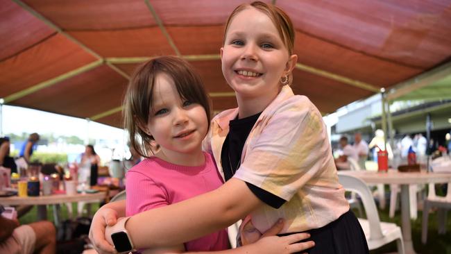 Addy Smith 6, and Beth Smith, 9, at the Chief Minister's Cup Day at the Darwin Turf Club on Saturday, July 15.