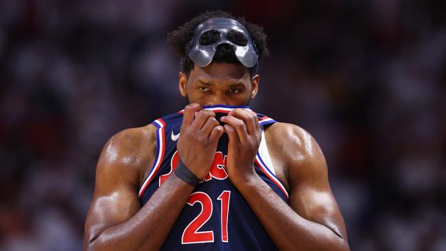 MIAMI, FLORIDA - MAY 10: Joel Embiid #21 of the Philadelphia 76ers reacts against the Miami Heat during the first half in Game Five of the Eastern Conference Semifinals at FTX Arena on May 10, 2022 in Miami, Florida. NOTE TO USER: User expressly acknowledges and agrees that, by downloading and or using this photograph, User is consenting to the terms and conditions of the Getty Images License Agreement.  (Photo by Michael Reaves/Getty Images)