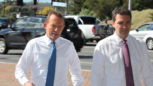 Tony Abbott, pictured with former Premier Steven Marshall, visits the corner of South Rd and Sturt Rd to make an infrastructure announcement.