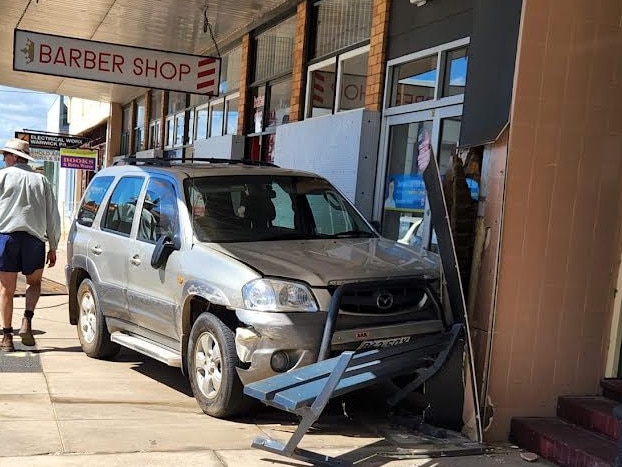 Visitors to a Warwick barber shop received the shock of a lifetime when a car smashed into the shop front.