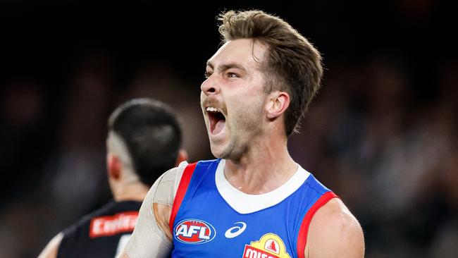 MELBOURNE, AUSTRALIA - MAY 31: Rhylee West of the Bulldogs celebrates a goal which put his team in front during the 2024 AFL Round 12 match between the Collingwood Magpies and the Adelaide Crows at The Melbourne Cricket Ground on May 31, 2024 in Melbourne, Australia. (Photo by Dylan Burns/AFL Photos via Getty Images)