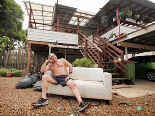 Goodna resident Frank Beaumont pictured outside his home when it dried out after the floods. Picture: Inga Williams IS310113POSTFLOOD2