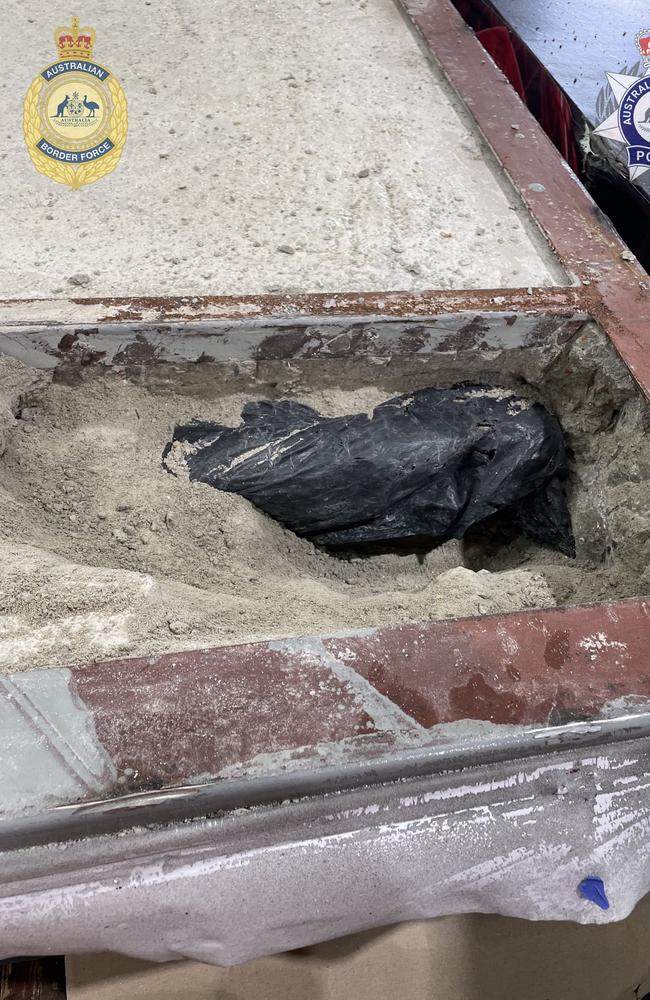 AFP investigators drilled into the concrete blocks and removed 960 packages, each containing about 350g of what is believed to be heroin. In total, police uncovered 336kg of the highly controlled substance. Picture: Australian Federal Police