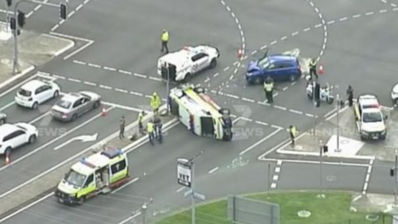 An ambulance has rolled after a crash at the intersection of Albany Creek Rd and Beckett Rd in Bridgeman Downs on Tuesday morning. Picture: 7 News Brisbane