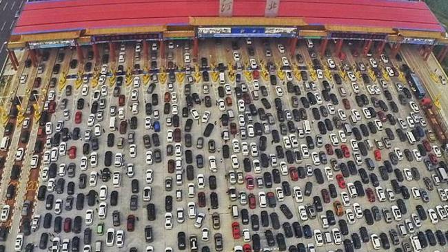 Vehicles a in a traffic jam near a toll station in Beijing. Australia doesn’t want this. Picture: Reuters.