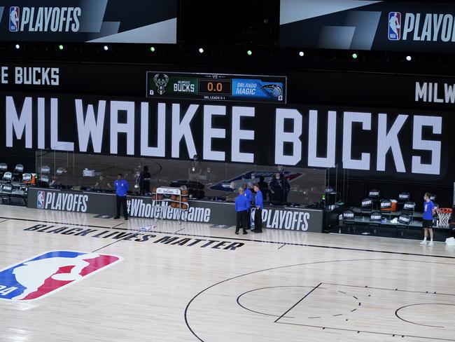 LAKE BUENA VISTA, FLORIDA - AUGUST 26: The benches are empty prior to the scheduled start of the first half of game five between the Orlando Magic and the Milwaukee Bucks in the first round of the 2020 NBA Playoffs at ESPN Wide World Of Sports Complex on August 26, 2020 in Lake Buena Vista, Florida. NOTE TO USER: User expressly acknowledges and agrees that, by downloading and or using this photograph, User is consenting to the terms and conditions of the Getty Images License Agreement. (Photo by Ashley Landis-Pool/Getty Images)