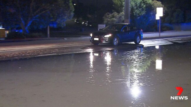 A burst water main on Valiant Rd has caused chaos for businesses and motorists at Holden Hill. Picture: 7NEWS