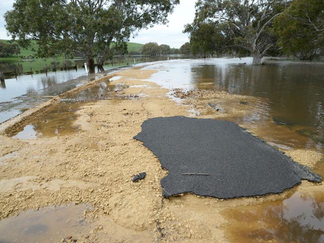 A section of Ridge Rd, Henty that has been washed away in the floods. Picture: Karla Northcott