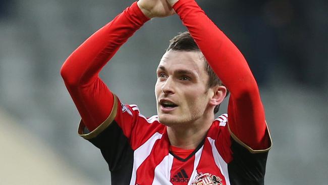 Sunderland 's goal-scorer Adam Johnson celebrates at the final whistle in the English Premier League football match between Newcastle United and Sunderland at St James' Park in Newcastle-upon-Tyne, north east England, on December 21, 2014. Sunderland won the game 1-0. AFP PHOTO/IAN MACNICOL RESTRICTED TO EDITORIAL USE. NO USE WITH UNAUTHORIZED AUDIO, VIDEO, DATA, FIXTURE LISTS, CLUB/LEAGUE LOGOS OR “LIVE” SERVICES. ONLINE IN-MATCH USE LIMITED TO 45 IMAGES, NO VIDEO EMULATION. NO USE IN BETTING, GAMES OR SINGLE CLUB/LEAGUE/PLAYER PUBLICATIONS.