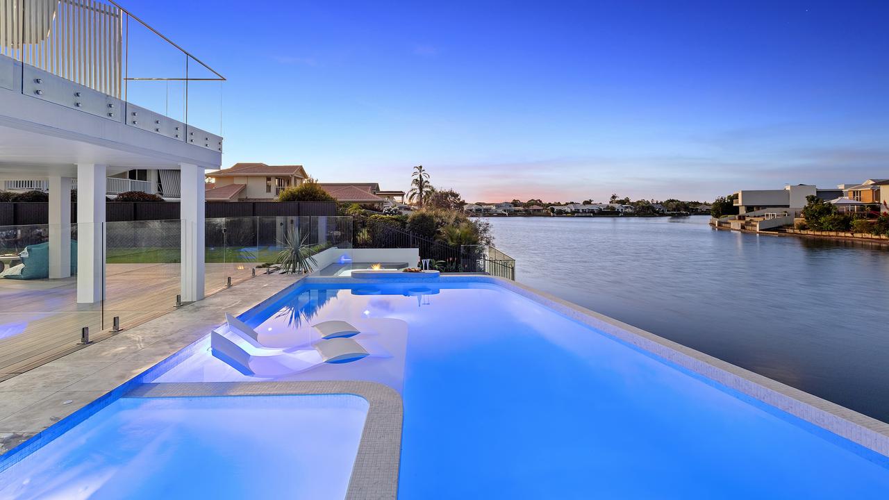 The home’s pool is built for adults to relax and drink in, as much as it’s built for swimming and play.