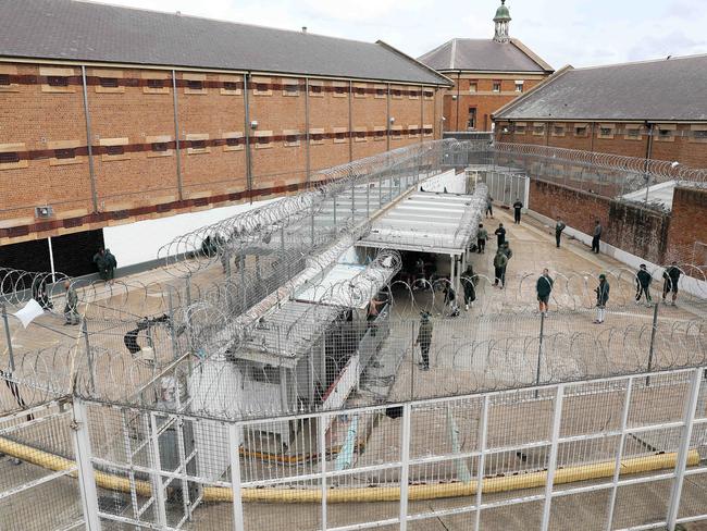 No escape. Prisoners in two of the 12 separated yards at Goulburn. Picture: Tim Hunter