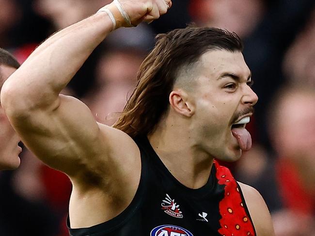 MELBOURNE, AUSTRALIA - APRIL 25: Nik Cox (left) and Sam Draper of the Bombers celebrate during the 2024 AFL Round 07 match between the Essendon Bombers and the Collingwood Magpies at the Melbourne Cricket Ground on April 25, 2024 in Melbourne, Australia. (Photo by Michael Willson/AFL Photos via Getty Images)