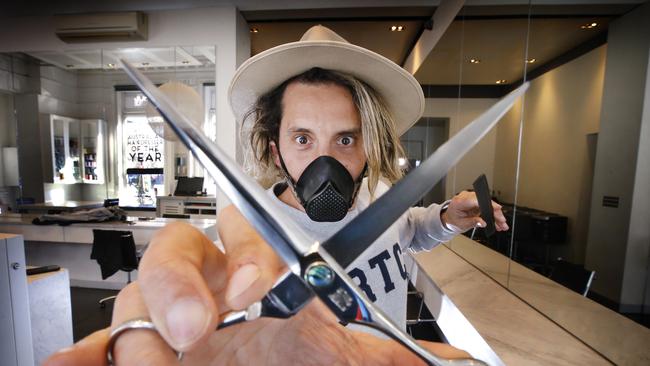 Hairdressers like Joey Scandizzo will be able to reopen with strict safety measures in place. Picture: David Caird