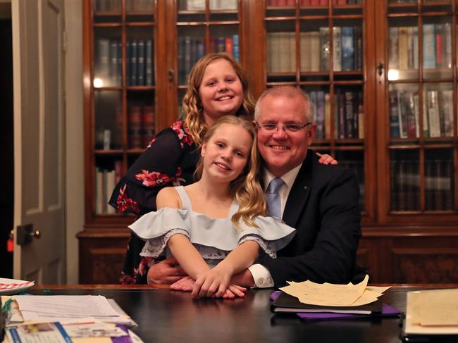 Prime Minister Scott Morrison with his daughters on election night. Picture: Adam Taylor