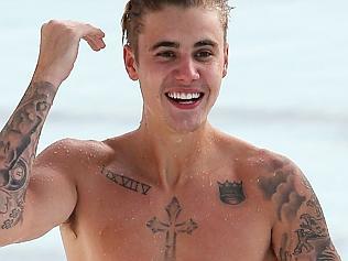 Justin Bieber spotted swimming at Bondi Iceberg in Sydney.