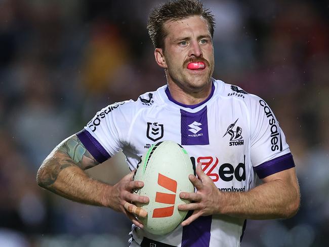 SYDNEY, AUSTRALIA - APRIL 14:  Cameron Munster of the Storm runs the ball during the round seven NRL match between the Manly Sea Eagles and Melbourne Storm at 4 Pines Park on April 14, 2023 in Sydney, Australia. (Photo by Cameron Spencer/Getty Images)