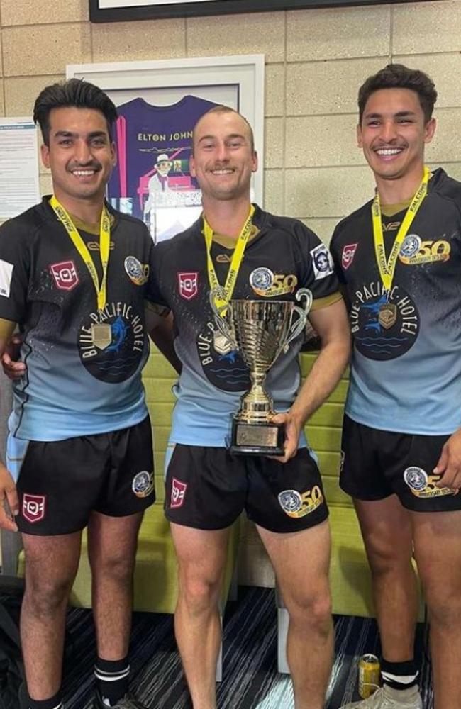 Troy Evans, Harvey Lew and Anthony Evans celebrate winning the 2023 SCGRL reserve grade premiership.