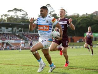 SYDNEY, AUSTRALIA - SEPTEMBER 19: Treymain Spry of the Titans makes a break past Tom Trbojevic of the Sea Eagles during the round 19 NRL match between the Manly Sea Eagles and the Gold Coast Titans at Lottoland on September 19, 2020 in Sydney, Australia. (Photo by Matt King/Getty Images)