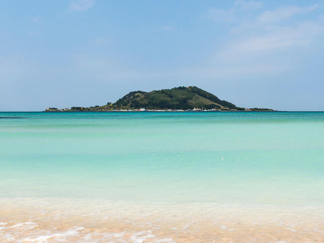 ESCAPE: F4N7FJ Hyeopjae Sandy Beach. Picture: Alamy