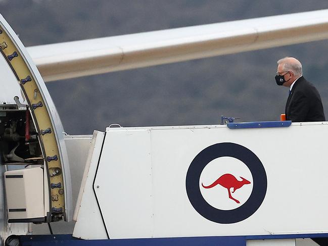 CANBERRA, AUSTRALIA NewsWire Photos OCTOBER, 28th 2021:  Prime Minister Scott Morrison boarded a RAAF aircraft at RAAF Fairbairn in Canberra to attend the COP 26 UN Climate Change Conference in Glasgow Scotland.Picture: NCA NewsWire / Gary Ramage