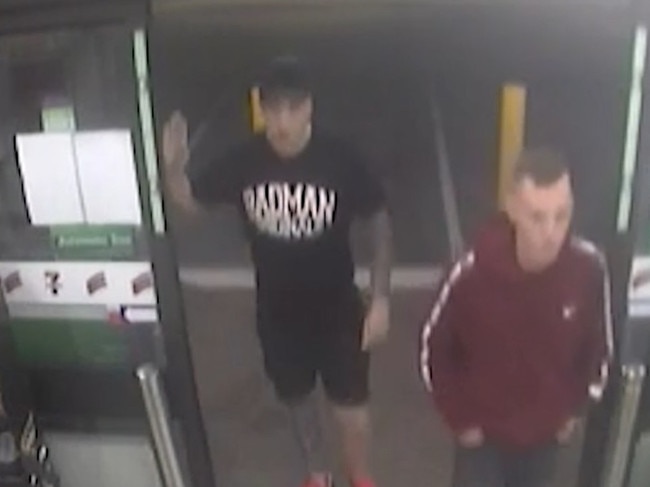 Two men are seen in the footage entering the service station.