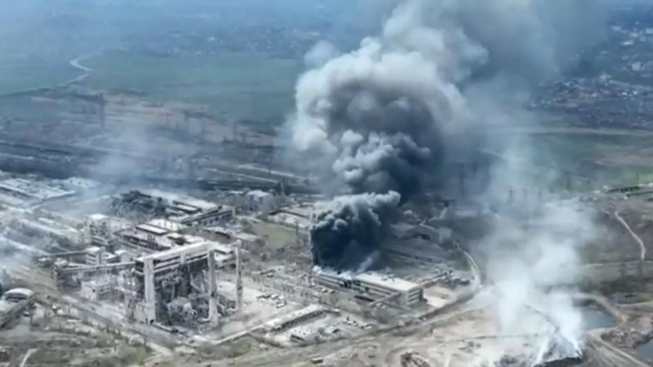 Clouds of smoke billowing from the Azovstal steel plant as Russia continues its push to capture the besieged port city of Mariupol. Picture: AFP