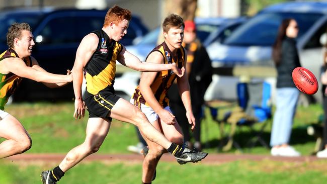 Jack Sausse gets a kick away for Broadview against Modbury earlier this season. Picture: AAP/Mark Brake