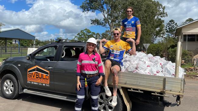 Marist Rams Lismore players put footy on hold and dug in for the flood recovery Picture: Marist Rams Lismore.