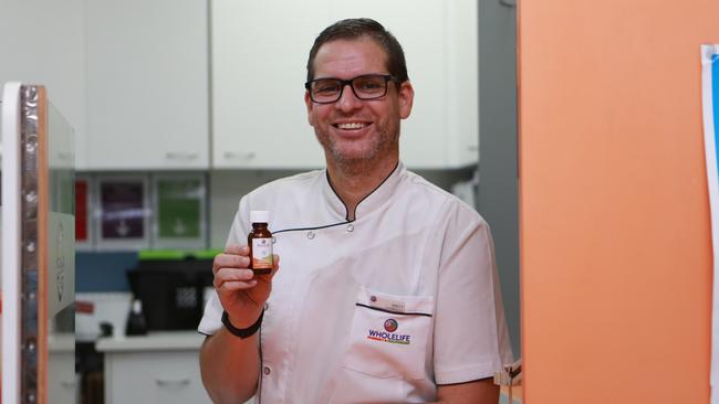 WholeLife Pharmacy and Healthfoods' pharmacist and manager Brett Christoffelsz has been working six to seven day weeks to cover a shortfall of staff. Picture: Arun Singh Mann