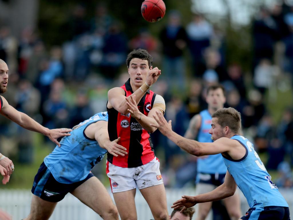 SANFL: Sturt v West Adelaide at Unley Oval. West's Tom Keough gets a handball away.18 August 2018. (AAP Image/Dean Martin)