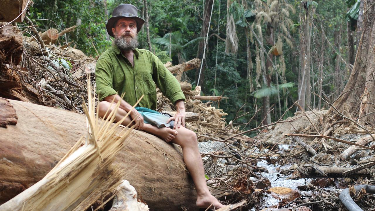 Cape Tribulation resident Rastah Rusch has not left town since ex-Tropical Cyclone Jasper crossed the coast in mid-December. Without a four-wheel-drive, Mr Rusch says he has no way to leave the community.