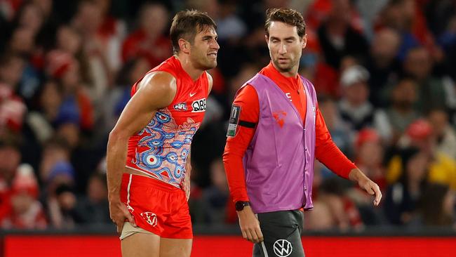 An injured Josh Kennedy grabs at his right hamstring during last week’s loss to Carlton. Picture: Getty Images